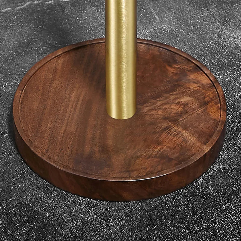 Crafted walnut paper towel holder displayed on a kitchen countertop