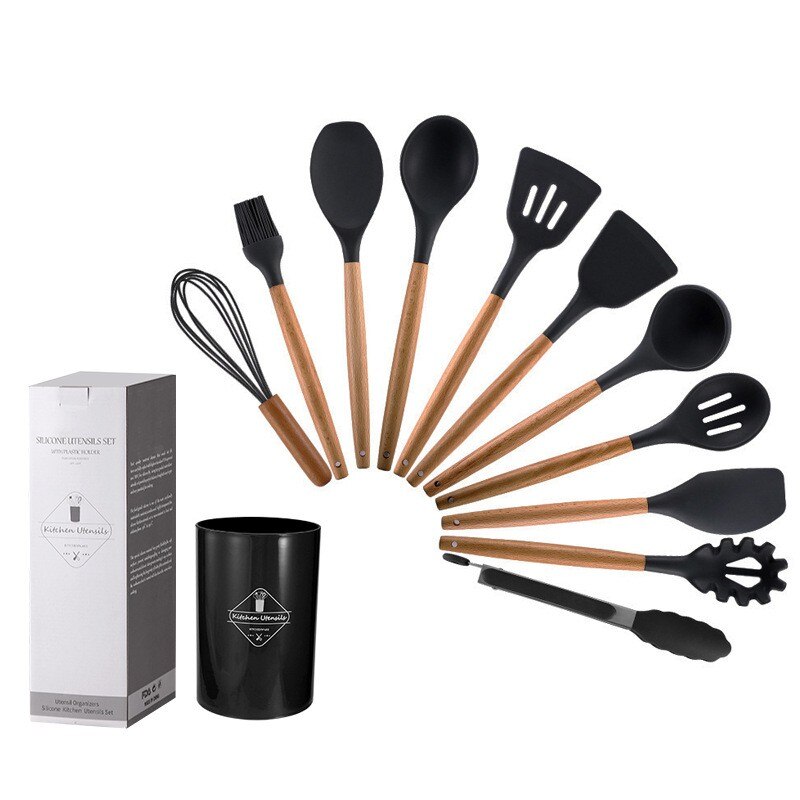 Non-stick kitchenware set displayed on a modern kitchen countertop.