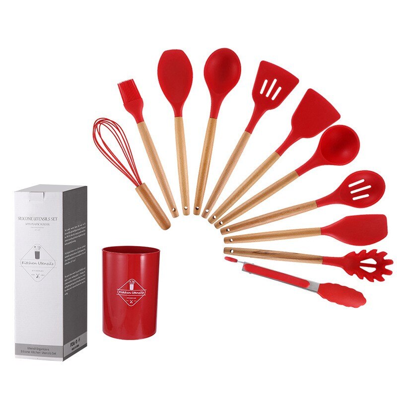 Non-stick kitchenware set displayed on a modern kitchen countertop.