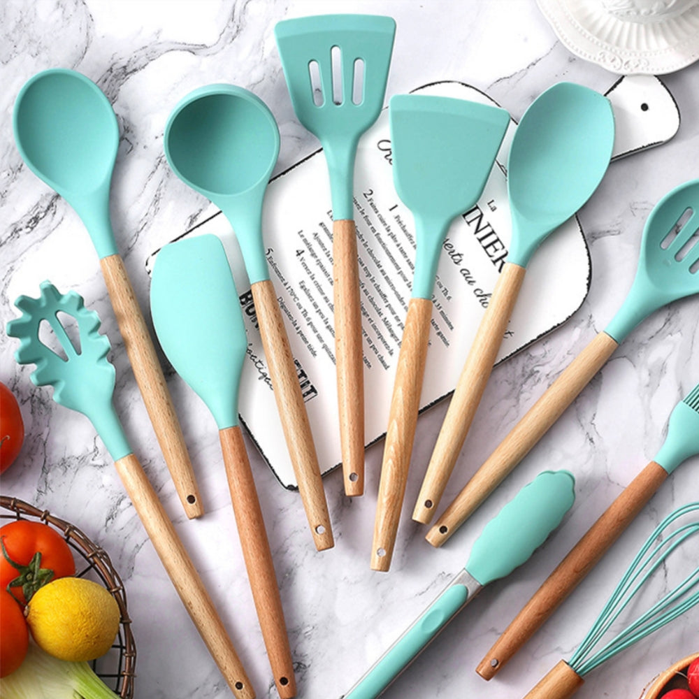 Non-stick kitchenware set displayed on a modern kitchen countertop 2