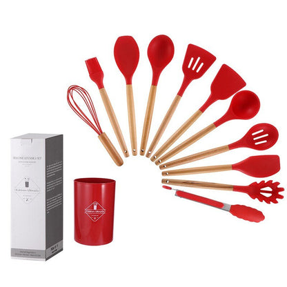 Non-stick kitchenware set displayed on a modern kitchen countertop.