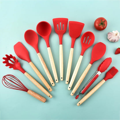 Non-stick kitchenware set displayed on a modern kitchen countertop.
